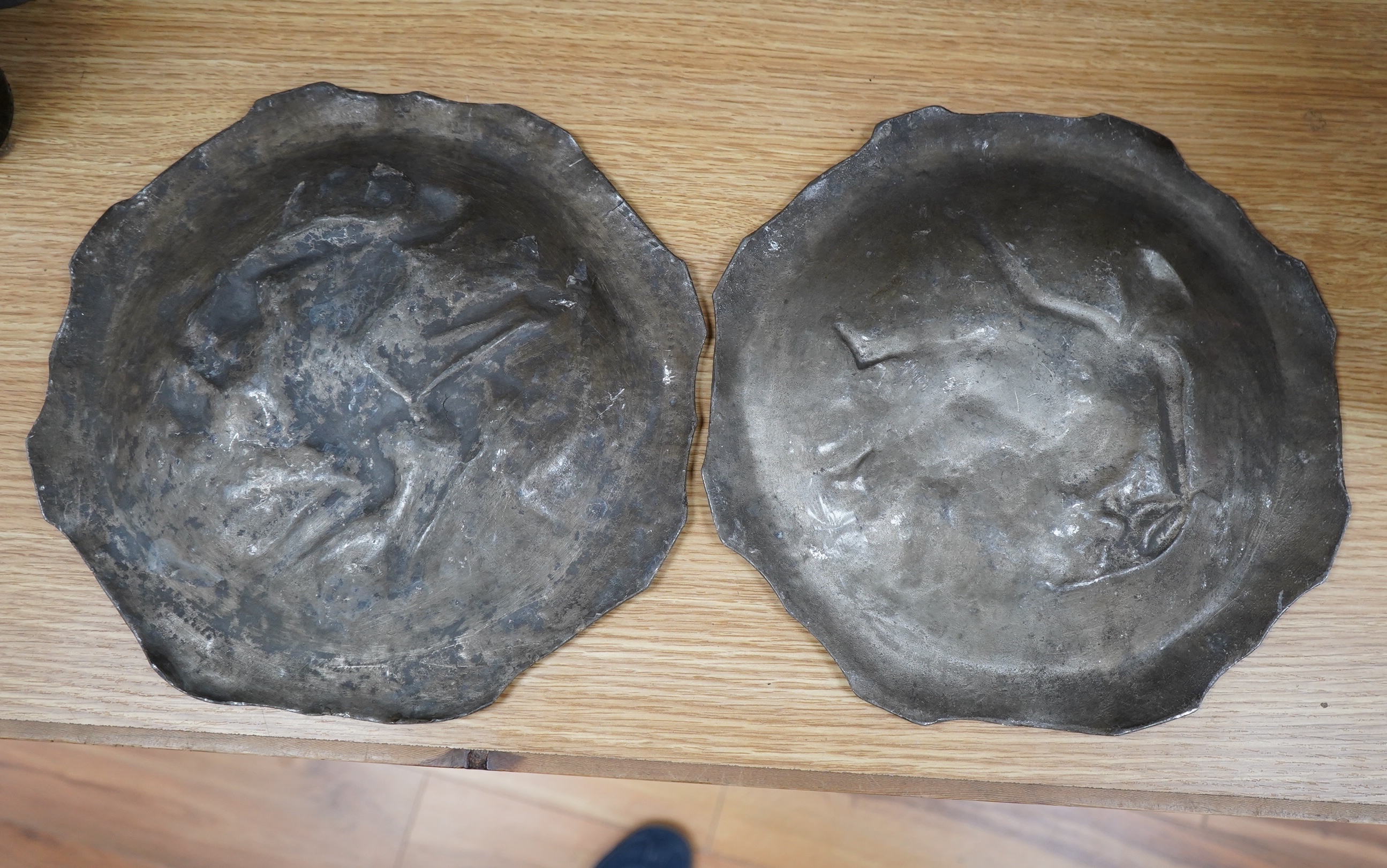 A pair of French pewter Art Nouveau plaques, signed Jacques Callot, 30cm. Condition - fair